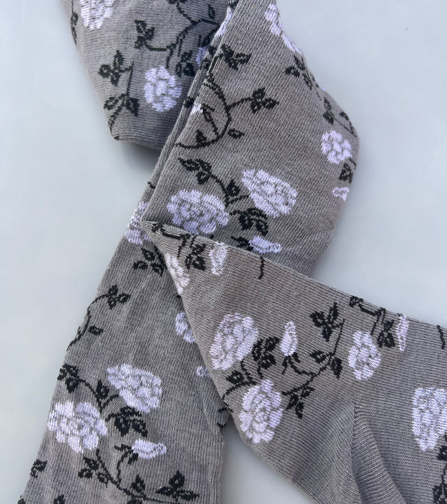 Floral print stockings.  Light grey.